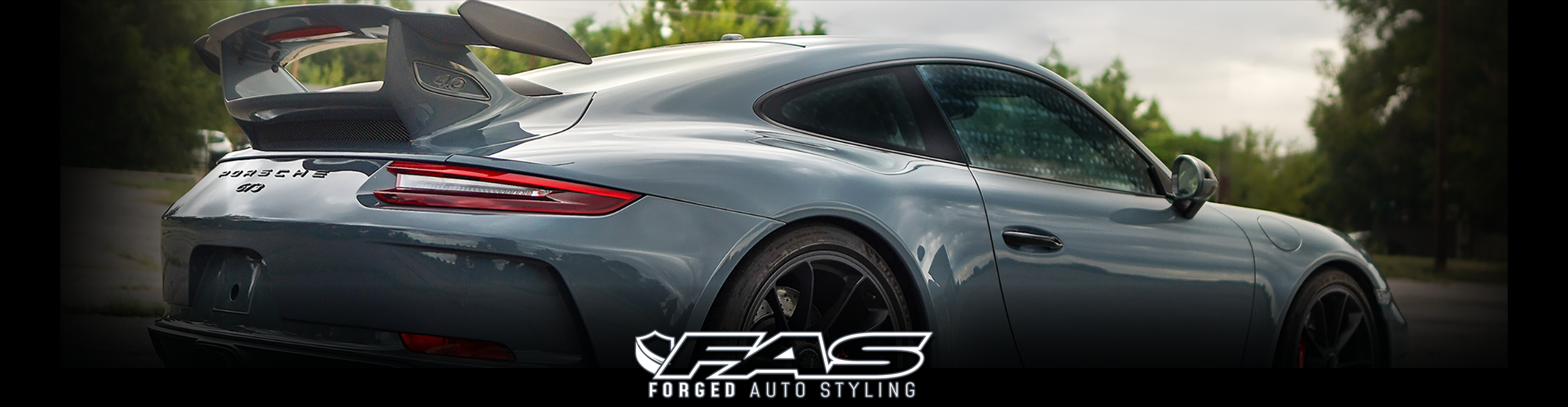 mainpagecarousel_fasLogo_BluePorsche